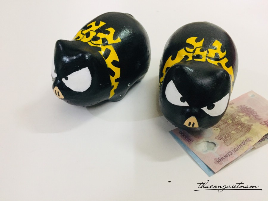Heo đất Heo đen nơ vàng 30*15cm