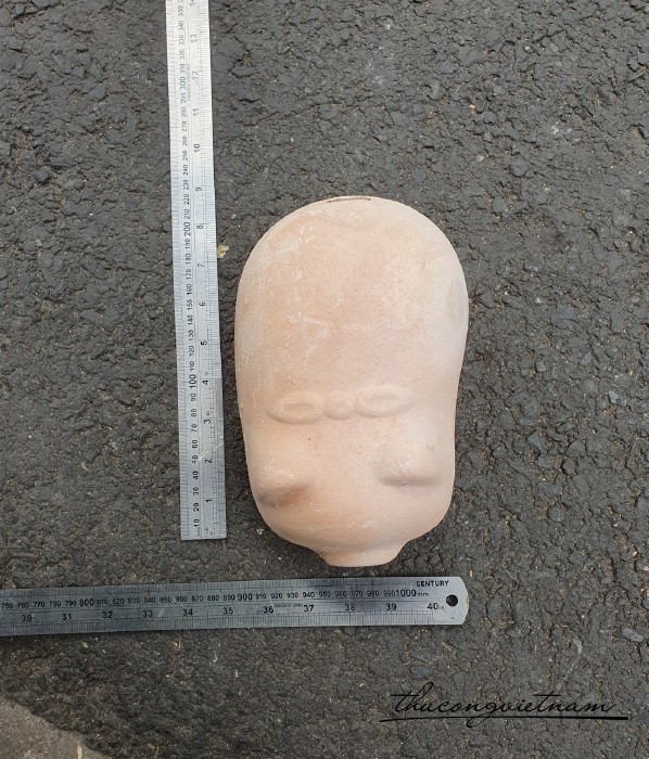 Heo đất nung nơ lớn 21*12cm