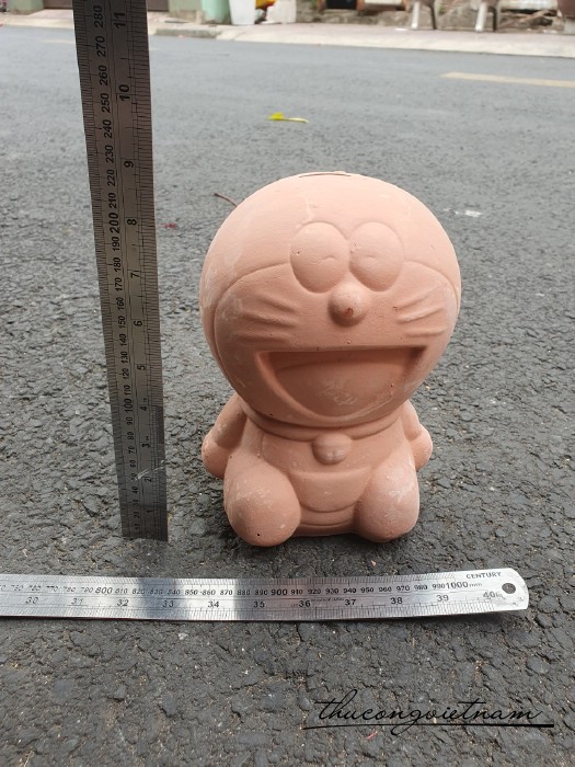 Heo đất nung Doraemon 20*10cm