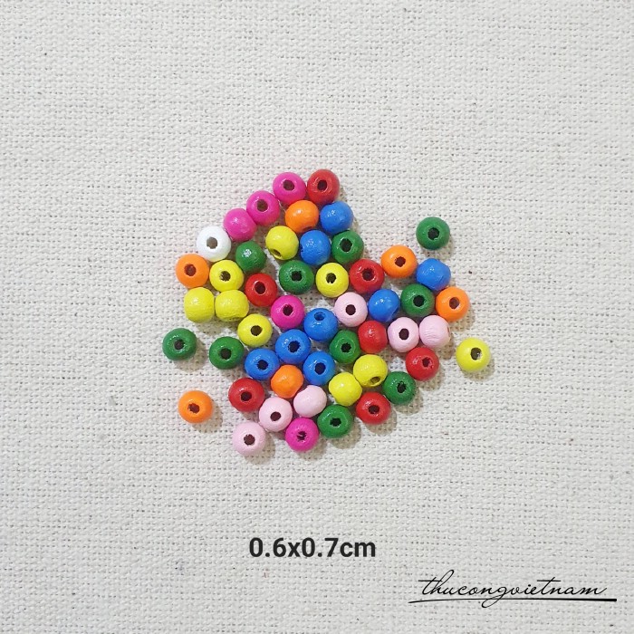 Hạt gỗ tròn nhiều màu 0.6x0.7cm (50g)