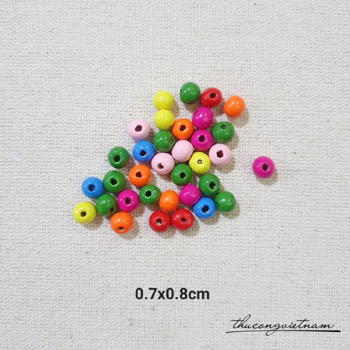 Hạt gỗ tròn nhiều màu 0.7x0.8cm (50g)