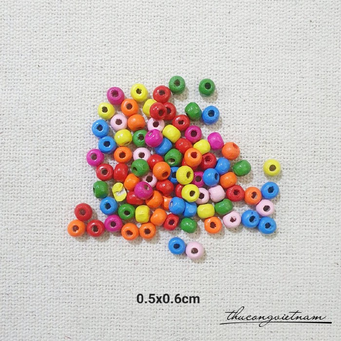 Hạt gỗ tròn nhiều màu 0.5x0.6cm (50g)