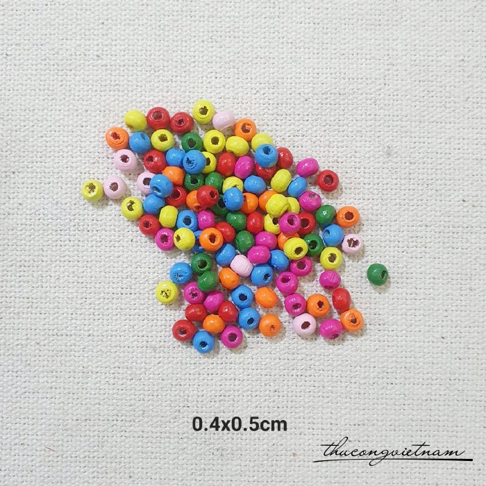 Hạt gỗ tròn nhiều màu 0.4x0.5cm (50g)