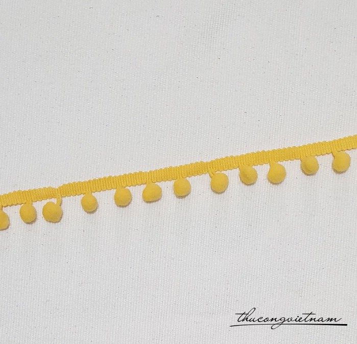 Dây ren viền pompom màu vàng đậm