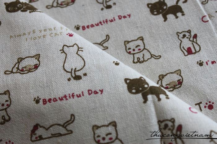 Vải vintage nền trắng họa tiết mèo con