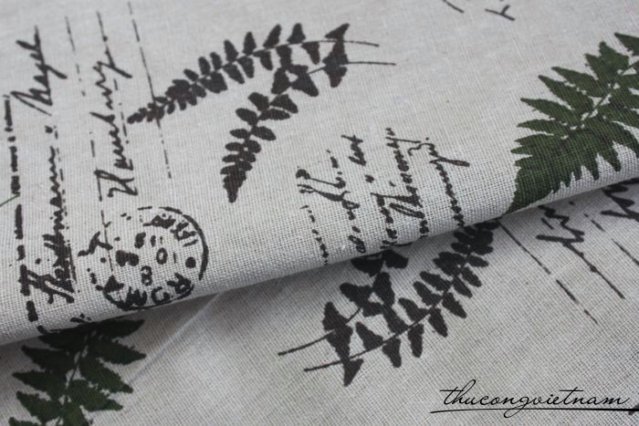 Vải vintage nền trắng họa tiết chữ và lá