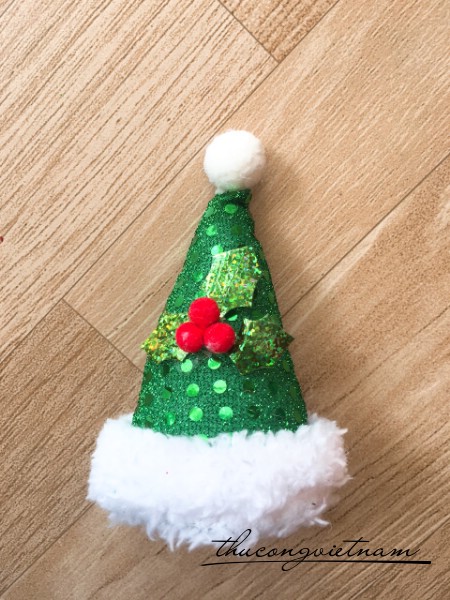 Nón ông già Noel màu xanh