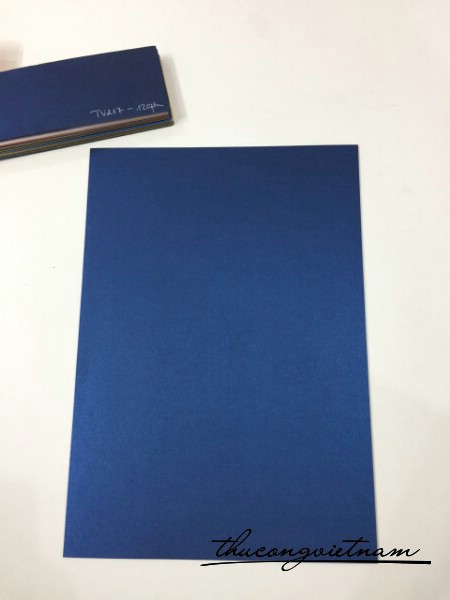 TV217_120gsm Xanh đen có nhũ mỏng 5k